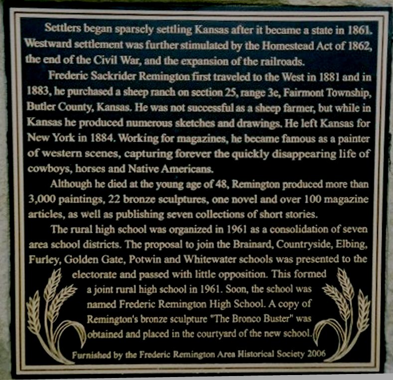 A black plaque with text Description automatically generated